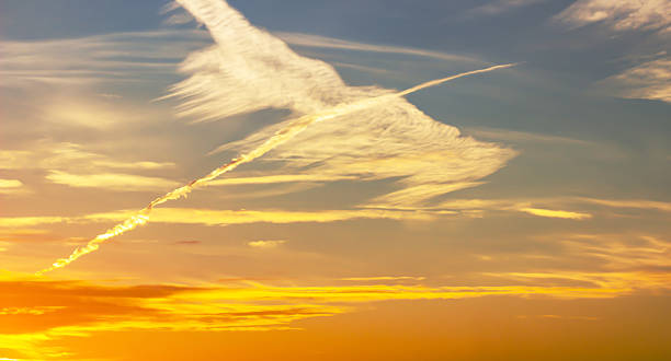 istock Beautiful sky sunset with blurred cloud /  orange and blue sunset sky / colorful sky and blurred cloud 585154412