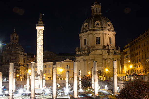 istock Trajan's Column at night in ancient Rome city 585155062