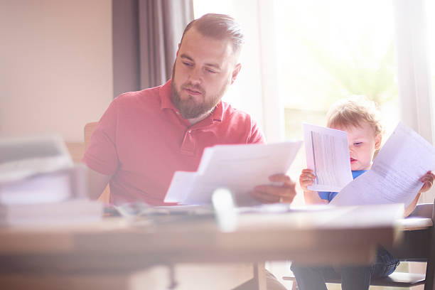 istock Young father working from home with toddler 585158238
