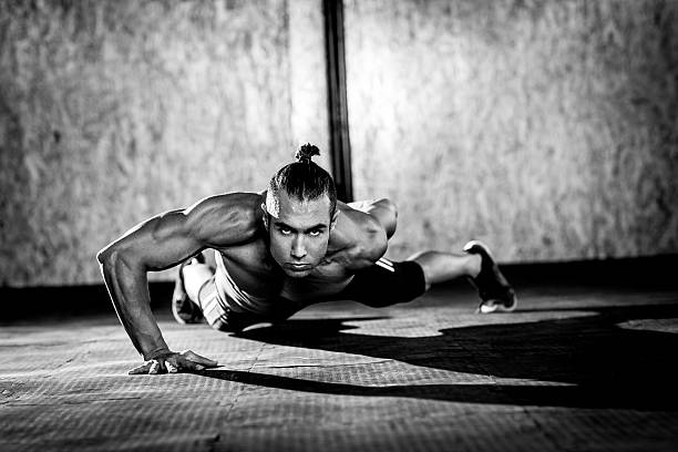 istock Young muscular man in gym 585158510