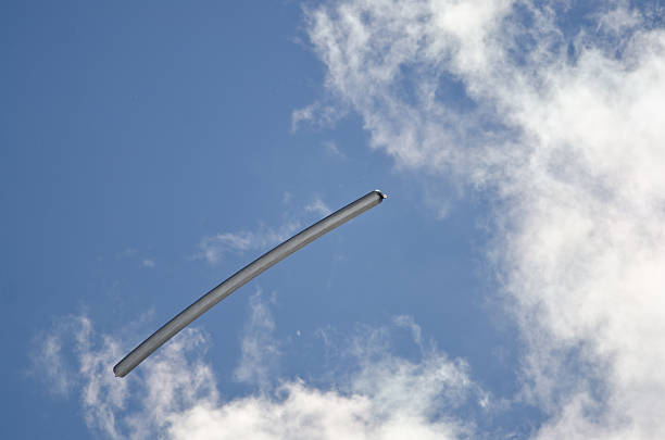 istock Solar Balloon Drifting Among the White Clouds 585159142