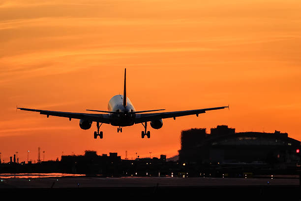 istock Airliner descending into Sky Harbor Airport. 585159504