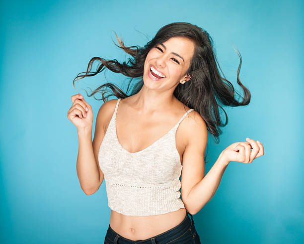 istock Young Mexican Women Dancing and Having Fun 585161828