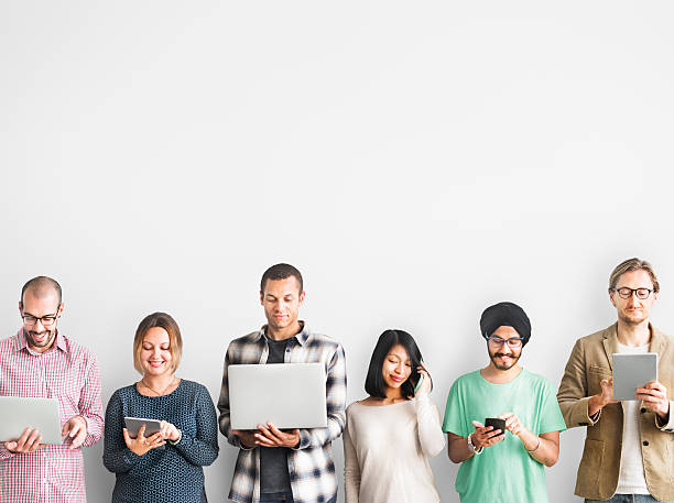 istock Group of People Connection Digital Device Concept 585163472