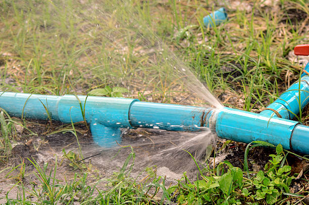 istock Breken pipeline with leakage water. 585164686