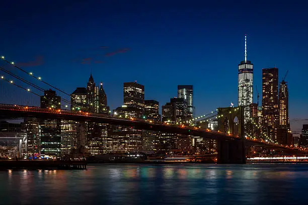 Photo of Brooklyn Bridge and Manhattan skyline on a clear night