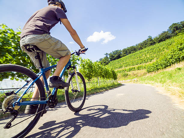 Young man riding his mountain bike