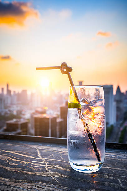 Gin Tonic with Blurred City Background