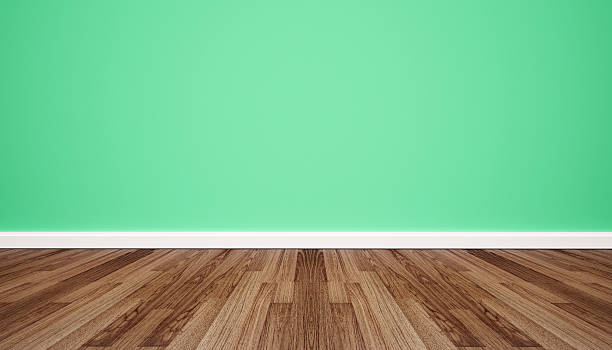 istock Wood floor with retro green wall 585167820