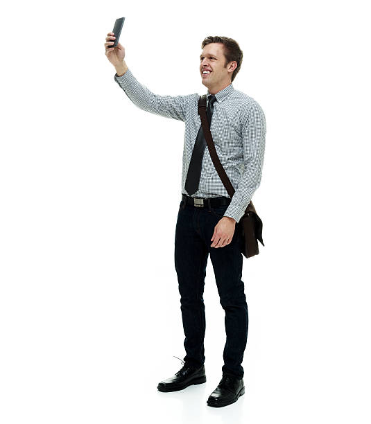 istock Smiling businessman taking a selfie 585168044