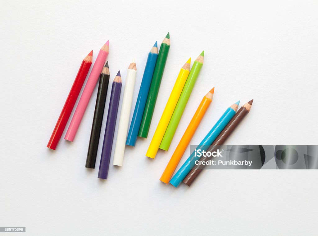 Bunch of fun mini colored pencils isolated on white Bunch of fun mini colored pencils isolated on white. Multicolor group of cute small wooden pencils Colored Pencil Stock Photo