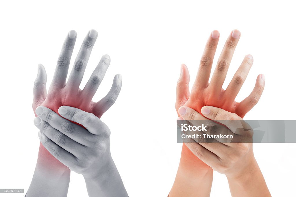 Woman massaging her painful hand on white background Pain Stock Photo