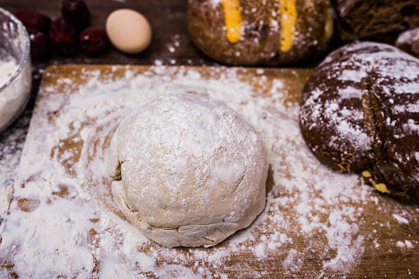 The dough on a wooden table