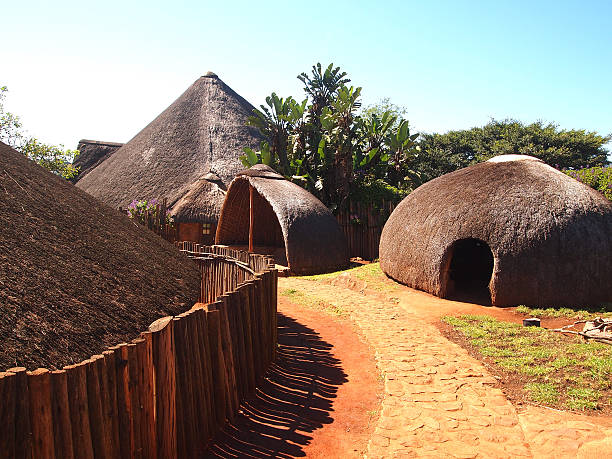 Traditional Zulu straw huts rondavels. Village in  KwaZulu-Natal Traditional  Zulu straw huts rondavels. Tribal ethnic style. Village in  KwaZulu-Natal, South Africa. Artistic retouching. zululand stock pictures, royalty-free photos & images