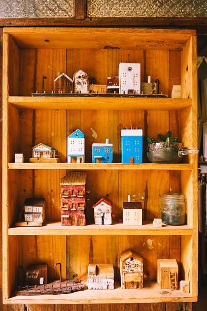 istock Small wood house model  in woodshelf interior decorate 585178092