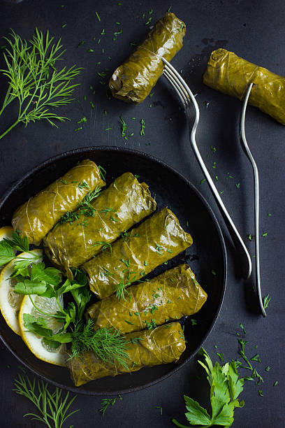istock Dolma, stuffed grape leaves with rice and meat 585178132