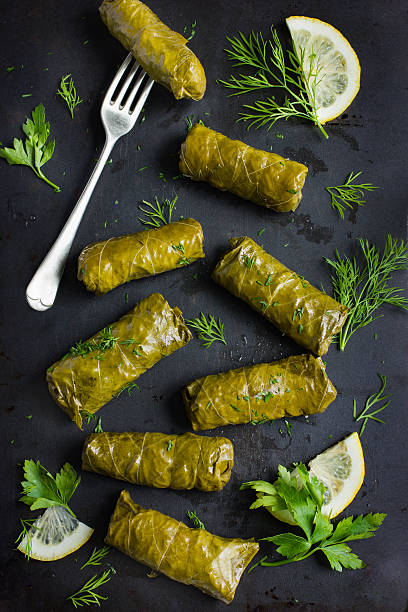 istock Dolma, stuffed grape leaves with rice and meat 585178868