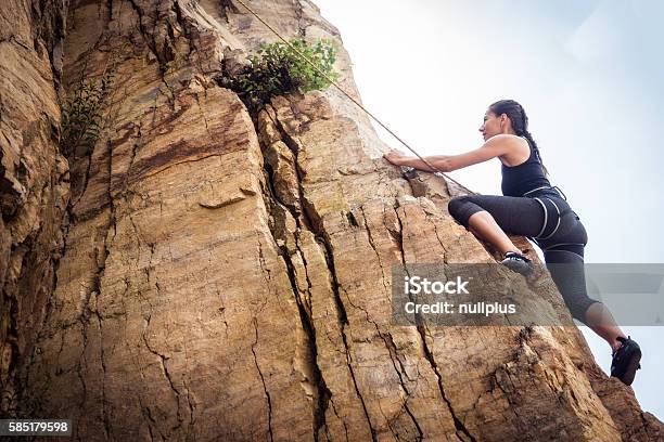 Young Climber Rock Climbing Stock Photo - Download Image Now - Climbing, Clambering, Women