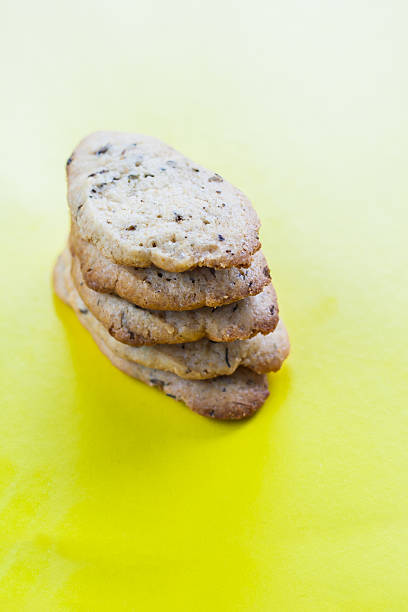 istock stack of cookies with lavender on a yellow background 585180650