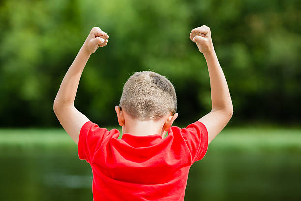istock Child celebrating success or victory 585181074