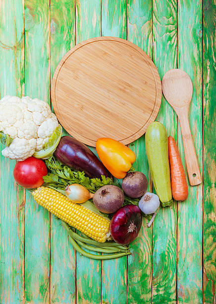 istock Fresh vegetables on a wooden table. Background. Healthy lifestyle 585181180
