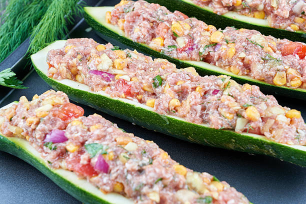 istock Raw courgettes stuffed with meat and vegetables 585182366