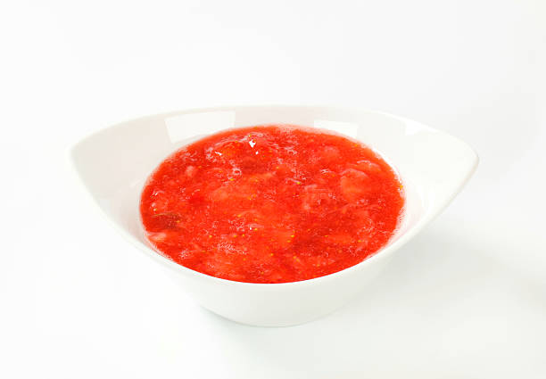 istock bowl of strawberry puree 585184222