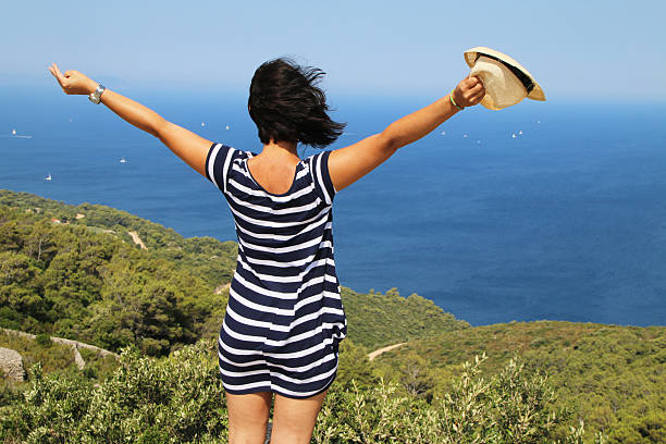 istock Freedom with wind in her hairs 585184348