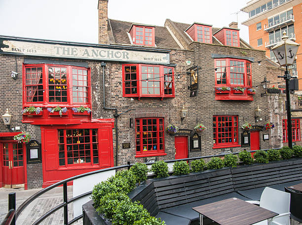London, England - July 16, 2013: Historic pub The Anchor dates back to 1615 is a landmark property on Bankside Southwark London UK.