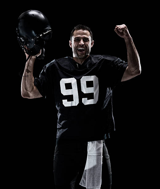 istock American football player cheering 585184866