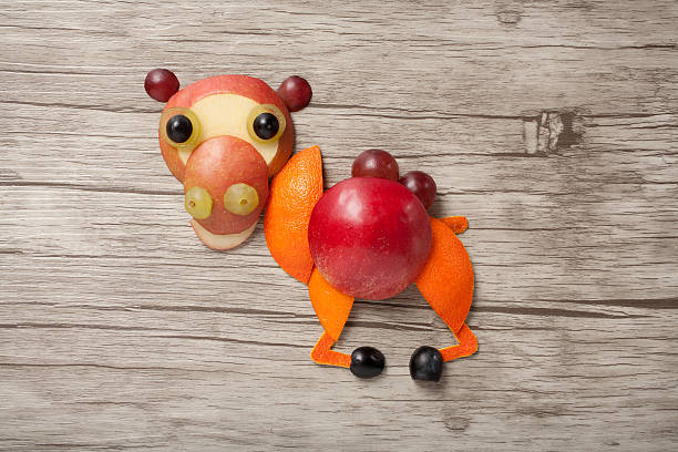 istock Funny camel made of apple 585189130