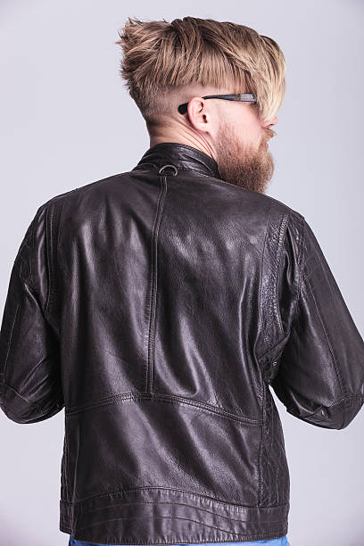 istock blond hipster man looking to his side. 585191166