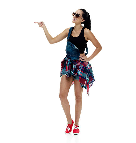 istock Smiling female pointing away 585281840