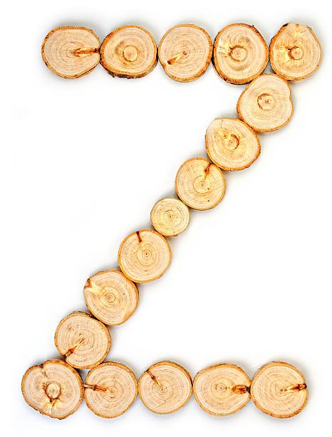 istock Alphabet letters made from Wood slice on white Background.Z 585281956