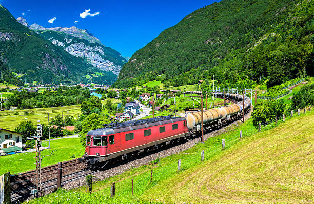 istock Freight train climbs up the Gotthard railway - Switzerland 585283122
