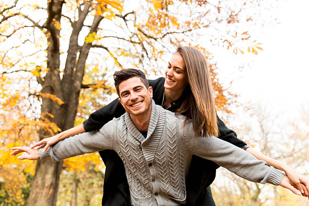 istock Young people having fun in the autumn park 585283202