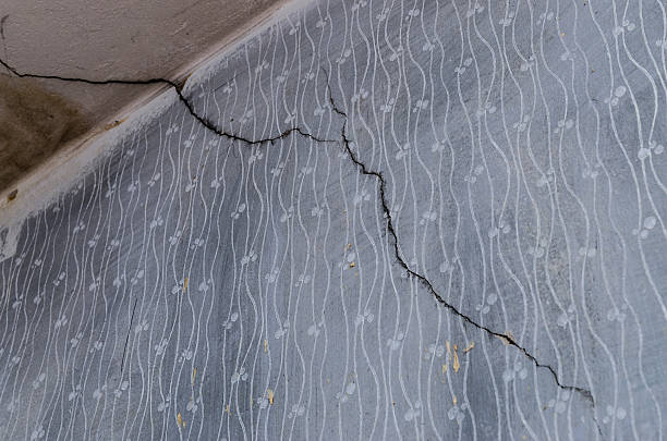 Long crack in a concrete wall stock photo