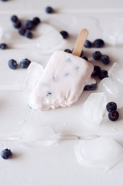 istock Ice popsicles with yogurt and blueberries. Sweet dairy dessert. 585285132