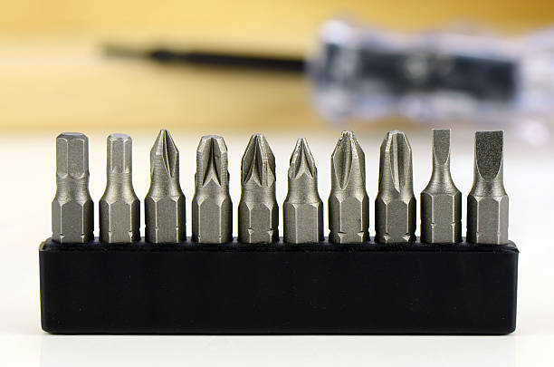 istock Cordless screwdrivers with various kind of screw tips. 585285256