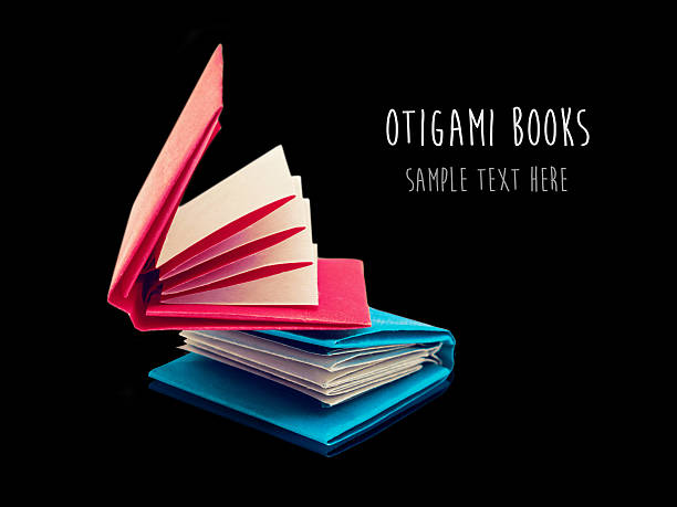istock Origami paper books 585286148