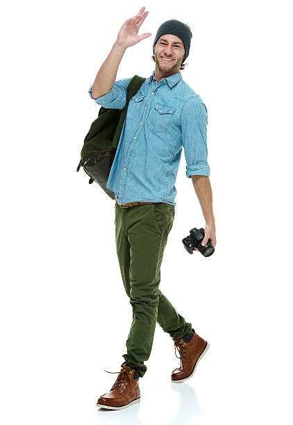 istock Smiling photographer waving hand 585286170