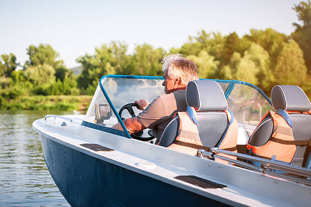 Kremenchug, Ukraine - July 2, 2017: Motor boat floating on the river Dnieper