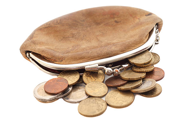 istock wallet with some euros coins isolated on white 585290522