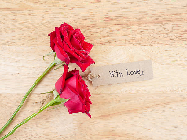 istock Handwriting With Love on brown label paper 2 585292520