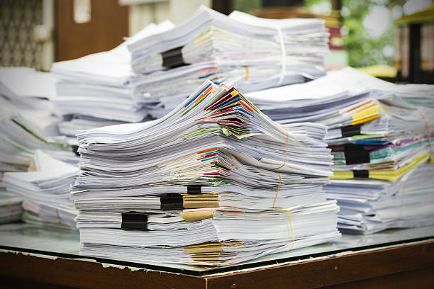 istock Pile of receipts on the desk 585292726
