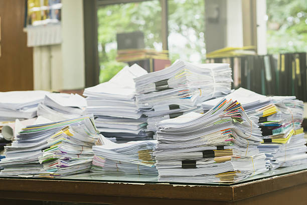 istock Pile of receipts on the desk 585292804