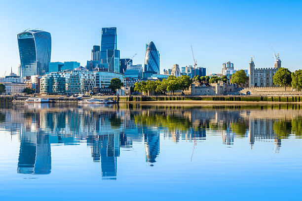 Cloudless day at financial district of London Cloudless day at financial district of London, including The Gherkin, Fenchurch building and Leadenhall building tower 42 stock pictures, royalty-free photos & images