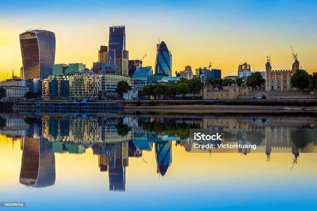 London Cityscape at Sunset with Reflection London cityscape at sunset with reflection from river Thames Blue Stock Photo