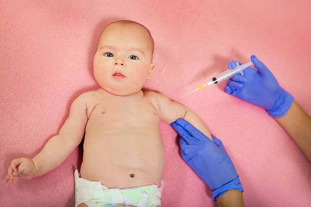 istock Baby receiving vaccine. 585300114