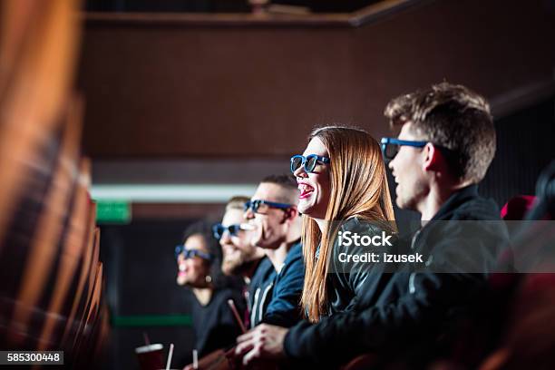 Group Of Young People In The 3d Movie Theater Stock Photo - Download Image Now - Movie Theater, Three Dimensional, 3-D Glasses